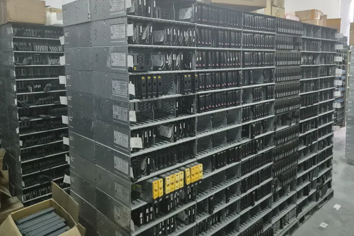 Disk shelves stacked on top of one another in a store room